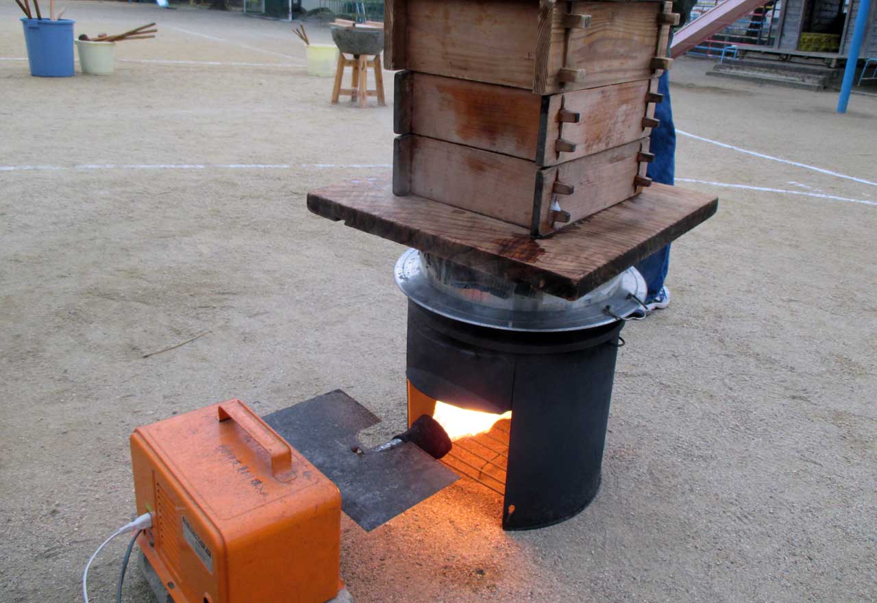 a torch heating up water for mochi